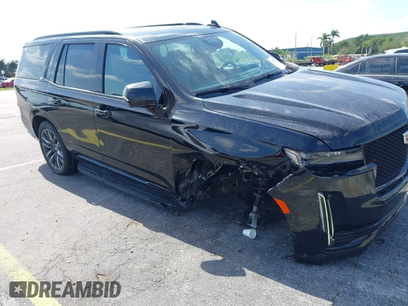 2023 Cadillac Escalade 4WD Sport z VIN 1GYS4EKLXPR513435, wystawiony jako IAAI lot #42137452 z przebiegiem 27 495 mil mil oraz . Historia ofert i sprzedaży dostępna na DreamBid. Obrazek 6.