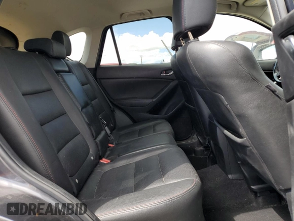 2015 Mazda CX-5 Grand Touring with VIN JM3KE4DY9F0536771, listed as a Copart auction lot 51801775 with 88,529 mi miles and Salvage Title. Bid and sale history available at DreamBid. Image 11.