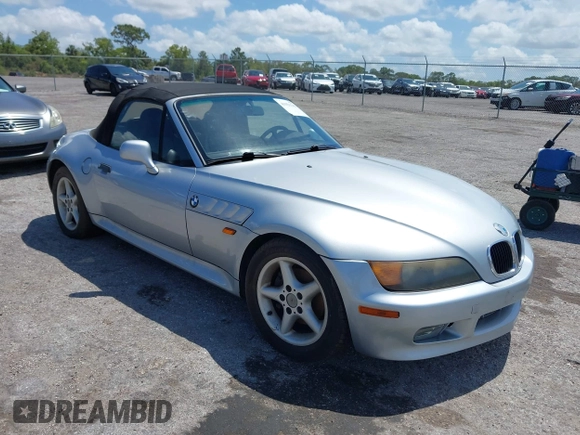1997 BMW 3 Series 2.8L with VIN 4USCJ3326VLC03034, listed as a IAAI auction lot 41921342 with 155,896 mi miles. Bid and sale history available at carsss.com. Image 1.