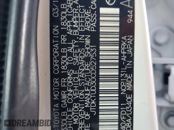 2012 Toyota Yaris L with VIN JTDKTUD30CD527531, listed as a Copart auction lot 65022015 with 157,177 mi miles and Salvage title. Bid and sale history available at DreamBid. Image 13.