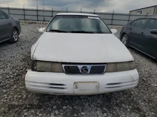 1995 Mercury Cougar z VIN 1MELM62W1SH624477, wystawiony jako Copart lot #56720625 z przebiegiem 156 034 mil mil oraz Szkoda całkowita • Salvage title. Historia ofert i sprzedaży dostępna na DreamBid. Obrazek 5.