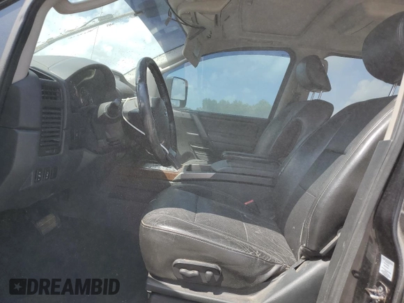 2011 Nissan Titan SL z VIN 1N6AA0EC8BN312137, wystawiony jako Copart lot #60227105 z przebiegiem 194 973 mil mil oraz Szkoda całkowita • Salvage title. Historia ofert i sprzedaży dostępna na DreamBid. Obrazek 7.