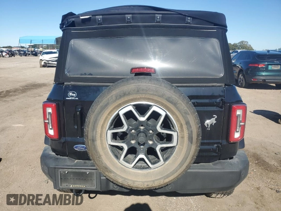 2023 Ford Bronco with VIN 1FMDE5BHXPLA82939, listed as a Copart auction lot 81402454 with 23,392 mi miles and Salvage Title. Bid and sale history available at DreamBid. Image 6.