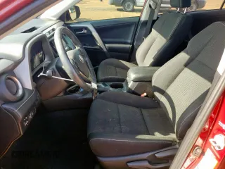 2018 Toyota RAV4 XLE with VIN 2T3RFREV7JW818661, listed as a Copart auction lot 65756615 with 56,369 mi miles and Salvage title. Bid and sale history available at DreamBid. Image 7.
