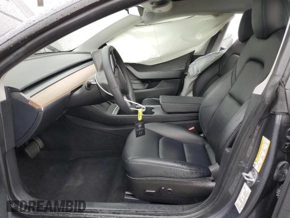 2023 Tesla Model 3 with VIN 5YJ3E1EA2PF708297, listed as a Copart auction lot 47982675 with 16,246 mi miles and Salvage title. Bid and sale history available at DreamBid. Image 7.
