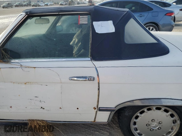 1980 Mercedes-Benz SL with VIN 10704412062529, listed as a Copart auction lot 77941784 with Not provided miles and Salvage title. Bid and sale history available at DreamBid. Image 12.