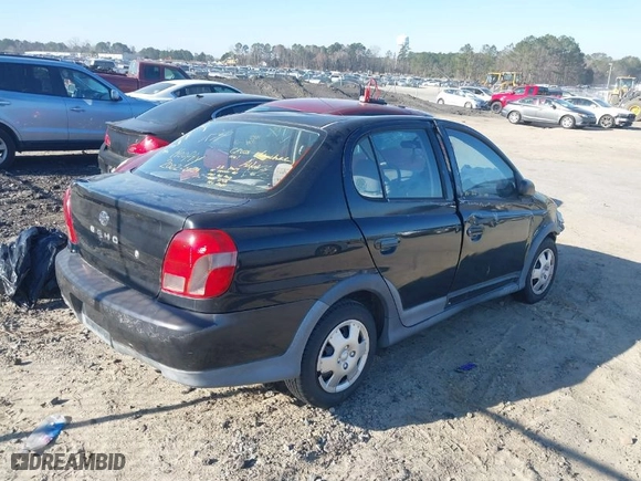 2002 Toyota ECHO with VIN JTDBT123025023104, listed as a IAAI auction lot 41708086 with NaN miles. Bid and sale history available at carsss.com. Image 4.