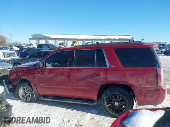 2015 GMC Yukon SLE with VIN 1GKS2AKC2FR514005, listed as a IAAI auction lot 41292783 with 129,413 mi miles. Bid and sale history available at carsss.com. Image 14.