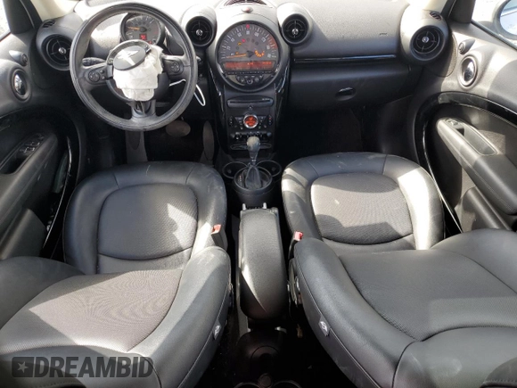 2015 MINI Countryman with VIN WMWZB3C50FWR44801, listed as a Copart auction lot 51957715 with 69,537 mi miles and Salvage Title. Bid and sale history available at DreamBid. Image 8.