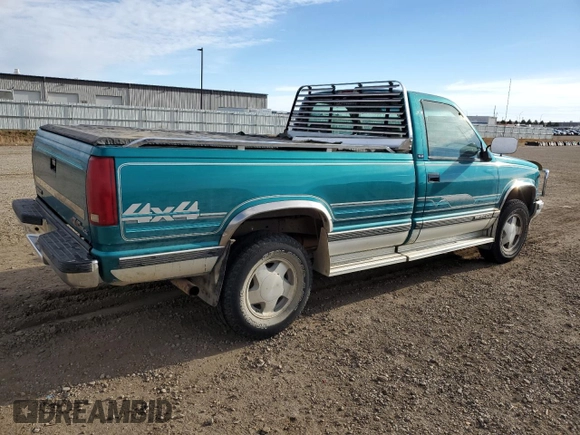 1994 GMC Sierra 1500 with VIN 1GTEK14K5RE539652, listed as a Copart auction lot 80877094 with 162,533 mi miles and Salvage Title. Bid and sale history available at DreamBid. Image 3.