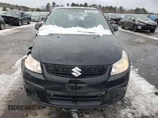 2012 Suzuki SX4 Crossover with VIN JS2YB5A30C6306884, listed as a Copart auction lot 86396074 with 91,557 mi miles and Salvage Title. Bid and sale history available at carsss.com. Image 5.