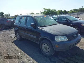 1999 Honda CR-V LX z VIN JHLRD2842XC010409, wystawiony jako IAAI lot #42402281 z przebiegiem 265 901 mil mil oraz . Historia ofert i sprzedaży dostępna na DreamBid. Obrazek 1.