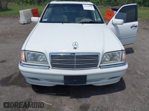 2000 Mercedes-Benz C 230/260/280/320 with VIN WDBHA29G7YA821337, listed as a IAAI auction lot 42210808 with 148,903 mi miles and . Bid and sale history available at carsss.com. Image 6.