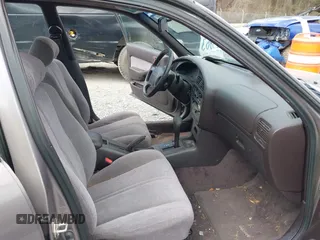 1994 Toyota Camry LE z VIN 4T1SK12E0RU463582, wystawiony jako IAAI lot #41823733 z przebiegiem 120 050 mil mil oraz . Historia ofert i sprzedaży dostępna na DreamBid. Obrazek 5.