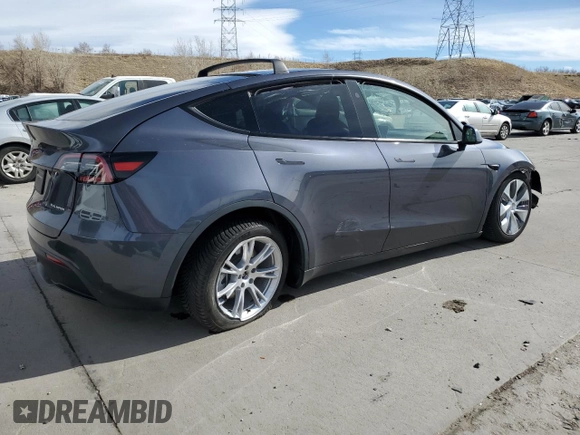 2023 Tesla Model Y Long Range with VIN 7SAYGAEE4PF873757, listed as a Copart auction lot 49530325 with 16,238 mi miles and Salvage Title. Bid and sale history available at DreamBid. Image 3.