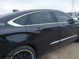 2015 Chevrolet Impala LTZ with VIN 1G1165S32FU141346, listed as a IAAI auction lot 41681418 with 146,823 mi miles. Bid and sale history available at carsss.com. Image 14.