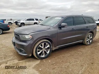 2014 Dodge Durango R/T z VIN 1C4SDJCT5EC594213, wystawiony jako Copart lot #59117975 z przebiegiem 160 029 mil mil oraz Czysty tytuł • Clean title. Historia ofert i sprzedaży dostępna na DreamBid. Obrazek 1.