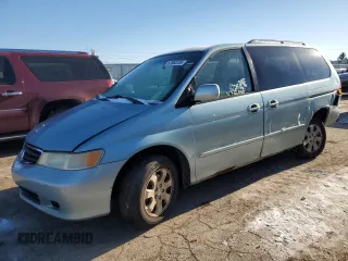 2004 Honda Odyssey EX-L with VIN 5FNRL18734B019512, listed as a Copart auction lot 87862235 with 265,504 mi miles and Salvage title. Bid and sale history available at DreamBid. Image 1.