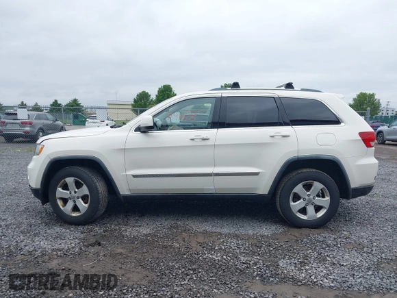 2011 Jeep Grand Cherokee Laredo with VIN 1J4RR4GG6BC680943, listed as a IAAI auction lot 42419575 with 188,672 mi miles and . Bid and sale history available at DreamBid. Image 14.