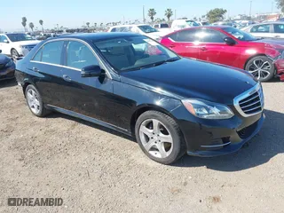 2015 Mercedes-Benz E-Class E 250 BlueTEC Luxury with VIN WDDHF0EB5FB120603, listed as a IAAI auction lot 41836068 with 112,264 mi miles. Bid and sale history available at carsss.com. Image 1.