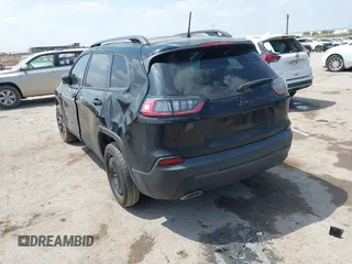 2021 Jeep Cherokee Latitude Lux with VIN 1C4PJLMXXMD134565, listed as a IAAI auction lot 42044643 with 84,611 mi miles and . Bid and sale history available at DreamBid. Image 3.
