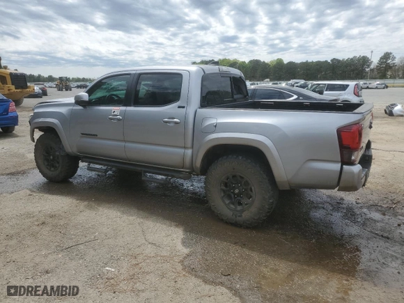 2020 Toyota Tacoma 4WD SR5 with VIN 3TMCZ5AN6LM310312, listed as a Copart auction lot 50162955 with 82,710 mi miles and Salvage Title. Bid and sale history available at carsss.com. Image 2.