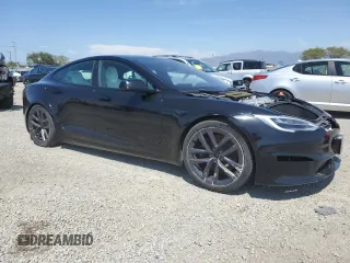 2022 Tesla Model S Plaid with VIN 5YJSA1E69NF460808, listed as a Copart auction lot 55181095 with 12,836 mi miles and Salvage Title. Bid and sale history available at DreamBid. Image 4.