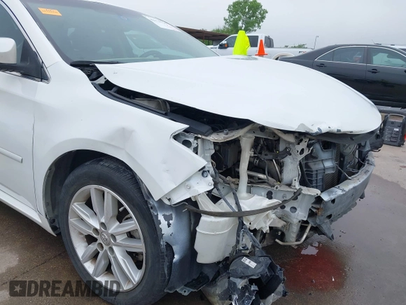 2014 Toyota Avalon Limited z VIN 4T1BK1EB6EU098479, wystawiony jako IAAI lot #42171736 z przebiegiem 92 290 mil mil oraz . Historia ofert i sprzedaży dostępna na DreamBid. Obrazek 19.