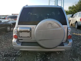 2004 Suzuki XL7 LX z VIN JS3TX92V044112500, wystawiony jako Copart lot #63123754 z przebiegiem 190 806 mil mil oraz Czysty tytuł • Clean title. Historia ofert i sprzedaży dostępna na DreamBid. Obrazek 6.