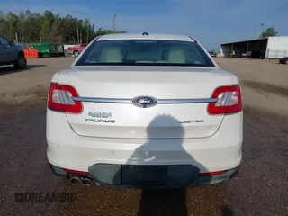 2012 Ford Taurus Limited z VIN 1FAHP2FW1CG103595, wystawiony jako IAAI lot #41913906 z przebiegiem 308 496 mil mil oraz . Historia ofert i sprzedaży dostępna na DreamBid. Obrazek 16.