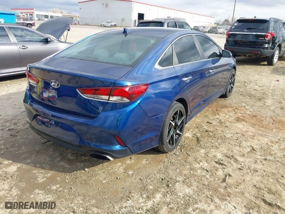 2019 Hyundai Sonata Sport with VIN 5NPE34AF3KH766494, listed as a IAAI auction lot 41677608 with 199,195 mi miles. Bid and sale history available at carsss.com. Image 4.