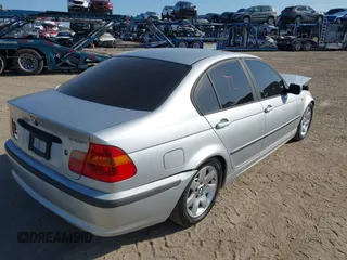 2002 BMW 3 Series 325i with VIN WBAEV33412KL55500, listed as a IAAI auction lot 42008308 with 172,852 mi miles. Bid and sale history available at carsss.com. Image 4.