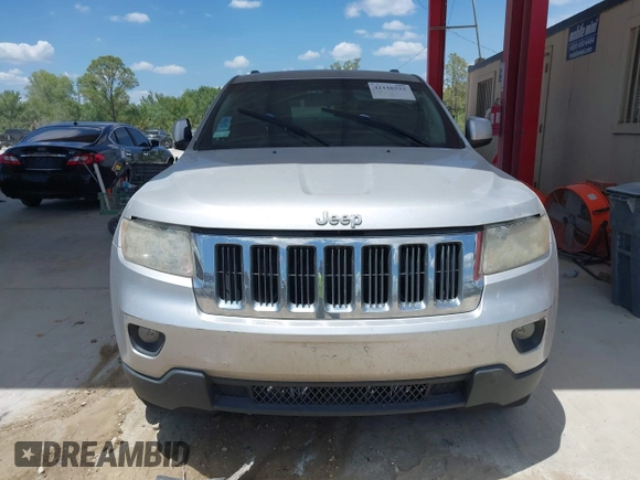2011 Jeep Grand Cherokee Laredo with VIN 1J4RR4GG3BC540655, listed as a IAAI auction lot 42158522 with 214,341 mi miles and . Bid and sale history available at DreamBid. Image 6.
