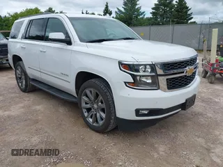 2020 Chevrolet Tahoe LT with VIN 1GNSKBKC8LR108377, listed as a IAAI auction lot 42545775 with 90,425 mi miles and . Bid and sale history available at DreamBid. Image 1.