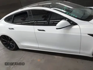 2017 Tesla Model S 100D z VIN 5YJSA1E2XHF224671, wystawiony jako IAAI lot #42665581 z przebiegiem 128 517 mil mil oraz . Historia ofert i sprzedaży dostępna na DreamBid. Obrazek 13.