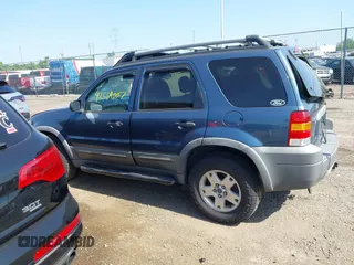 2005 Ford Escape XLT z VIN 1FMCU931X5KD62886, wystawiony jako IAAI lot #42564007 z przebiegiem 134 080 mil mil oraz . Historia ofert i sprzedaży dostępna na DreamBid. Obrazek 14.