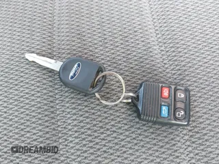 2004 Ford Explorer XLT z VIN 1FMZU73K74UB13312, wystawiony jako IAAI lot #42734477 z przebiegiem Nie podano mil oraz . Historia ofert i sprzedaży dostępna na DreamBid. Obrazek 11.