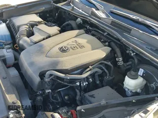 2021 Toyota Tacoma SR with VIN 3TMCZ5AN2MM385607, listed as a IAAI auction lot 43138606 with 33,497 mi miles and . Bid and sale history available at DreamBid. Image 19.