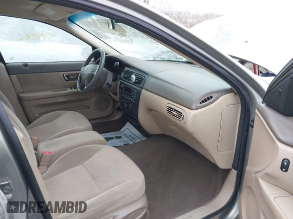2002 Ford Taurus SE Standard with VIN 1FAFP53U92G153588, listed as a IAAI auction lot 41589338 with 57,856 mi miles and . Bid and sale history available at DreamBid. Image 4.