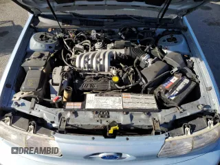 1993 Ford Taurus z VIN 1FACP5216PG197713, wystawiony jako Copart lot #80982424 z przebiegiem 79 330 mil mil oraz Szkoda całkowita • Salvage title. Historia ofert i sprzedaży dostępna na DreamBid. Obrazek 11.