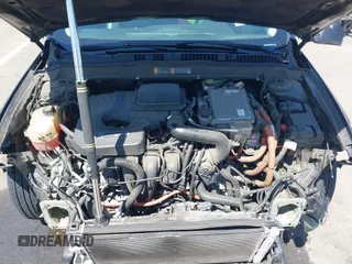 2016 Ford Fusion Titanium Hybrid z VIN 3FA6P0RUXGR123445, wystawiony jako IAAI lot #42606596 z przebiegiem 145 541 mil mil oraz . Historia ofert i sprzedaży dostępna na DreamBid. Obrazek 10.