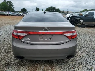 2013 Hyundai Azera z VIN KMHFH4JG4DA262993, wystawiony jako Copart lot #58497925 z przebiegiem 151 568 mil mil oraz Szkoda całkowita • Salvage title. Historia ofert i sprzedaży dostępna na DreamBid. Obrazek 6.