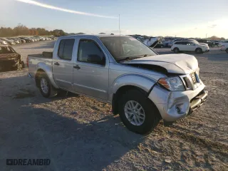 2018 Nissan Frontier S with VIN 1N6DD0ER1JN720065, listed as a Copart auction lot 79056074 with 97,459 mi miles and Salvage Title. Bid and sale history available at carsss.com. Image 4.