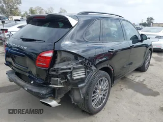 2014 Porsche Cayenne with VIN WP1AA2A29ELA97300, listed as a IAAI auction lot 42106931 with 156,129 mi miles and . Bid and sale history available at DreamBid. Image 4.
