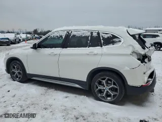 2019 BMW X1 xDrive28i with VIN WBXHT3C54K5L91407, listed as a Copart auction lot 84875904 with 97,304 mi miles and Salvage Title. Bid and sale history available at carsss.com. Image 2.