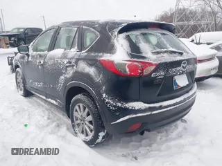 2016 Mazda CX-5 Sport z VIN JM3KE4BY0G0919017, wystawiony jako IAAI lot #41316161 z przebiegiem 209 259 mil mil oraz . Historia ofert i sprzedaży dostępna na DreamBid. Obrazek 3.