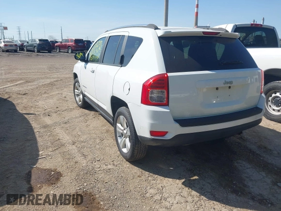 2012 Jeep Compass Latitude with VIN 1C4NJCEA7CD639298, listed as a IAAI auction lot 42121430 with 166,409 mi miles. Bid and sale history available at carsss.com. Image 3.