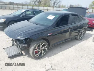 2023 Volkswagen Jetta GLI Autobahn z VIN 3VW2T7BU2PM054137, wystawiony jako IAAI lot #42029063 z przebiegiem 17 456 mil mil oraz . Historia ofert i sprzedaży dostępna na DreamBid. Obrazek 2.