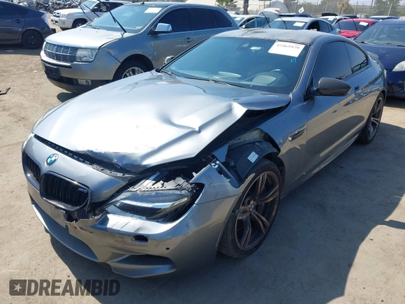 2013 BMW M6 with VIN WBSLX9C51DC968593, listed as a IAAI auction lot 42465979 with 88,010 mi miles and . Bid and sale history available at DreamBid. Image 20.