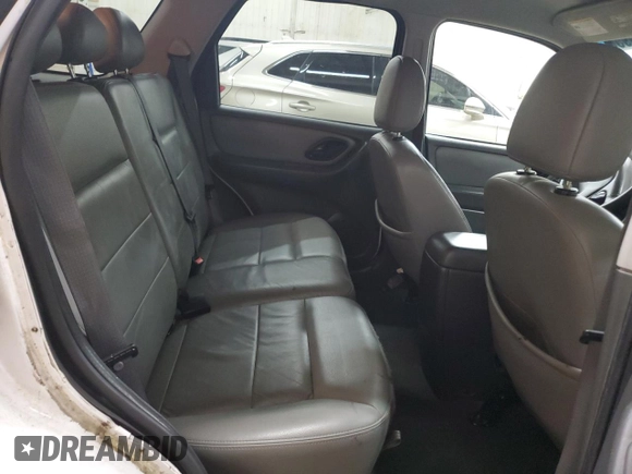 2006 Ford Escape XLT with VIN 1FMCU03106KC14923, listed as a Copart auction lot 52727095 with 126,842 mi miles and Salvage Title. Bid and sale history available at DreamBid. Image 12.